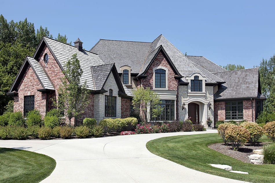 Large brick home with circular driveway