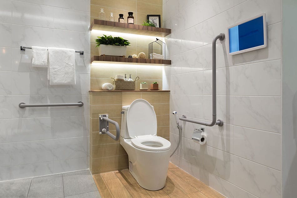 Interior of bathroom for the disabled or elderly people. Handrai